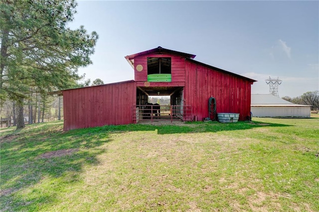 view of shed / structure featuring a yard