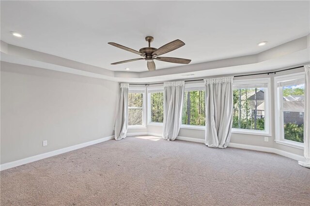 5153 Elkins Ln, Acworth, GA 30101 - carpeted spare room with a tray ceiling, a ceiling fan, and recessed lighting
