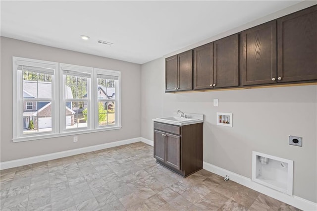 5153 Elkins Ln, Acworth, GA 30101 - laundry room with hookup for an electric dryer, cabinet space, hookup for a washing machine, hookup for a gas dryer, and recessed lighting