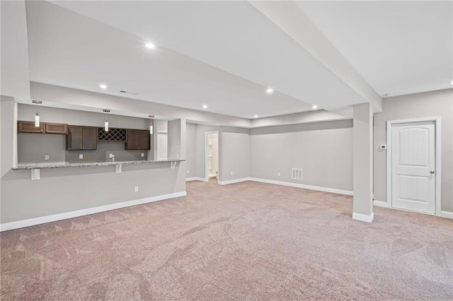 5153 Elkins Ln, Acworth, GA 30101 - unfurnished living room with light colored carpet and recessed lighting