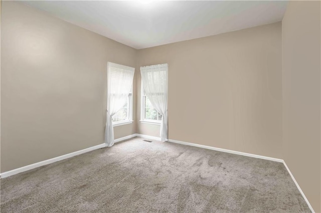 3780 Summit Gate Dr, Suwanee, GA 30024 - carpeted spare room with baseboards