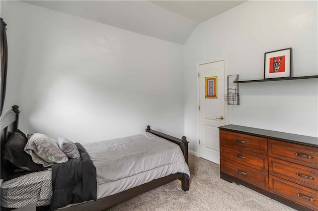 3780 Summit Gate Dr, Suwanee, GA 30024 - bedroom featuring light carpet, lofted ceiling, and baseboards