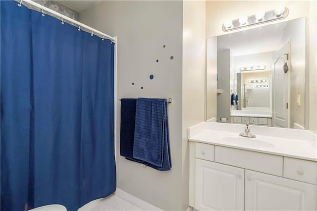 3780 Summit Gate Dr, Suwanee, GA 30024 - bathroom with vanity, tile patterned flooring, baseboards, and a shower with shower curtain