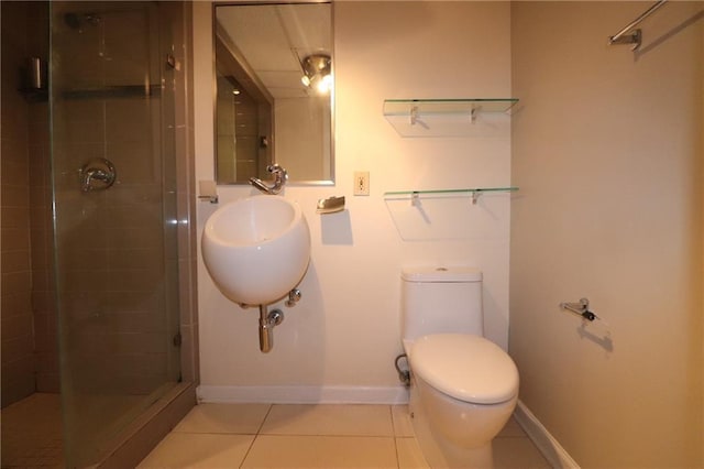 bathroom featuring walk in shower, sink, toilet, and tile patterned flooring