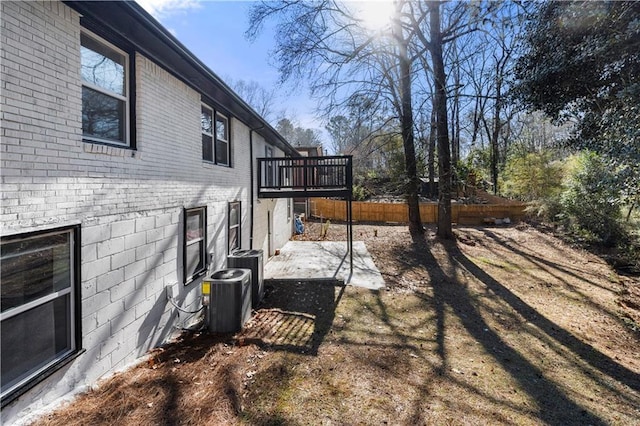 view of yard featuring a patio and cooling unit