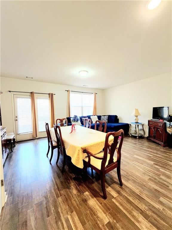 dining room with wood finished floors