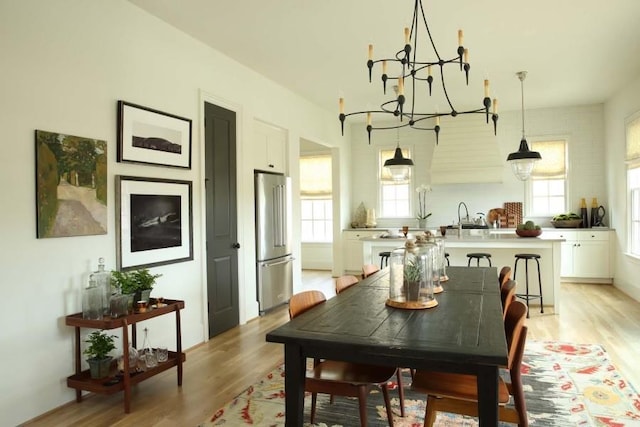 2067 Telfair Cir Unit A & B, Atlanta, GA 30324 - dining area with a chandelier and light wood-style flooring