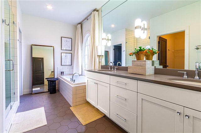 2067 Telfair Cir Unit A & B, Atlanta, GA 30324 - bathroom featuring a shower stall, double vanity, a garden tub, a spacious closet, and recessed lighting