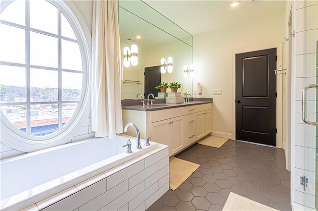 2067 Telfair Cir Unit A & B, Atlanta, GA 30324 - full bathroom with double vanity, plenty of natural light, a bath, tile patterned flooring, and recessed lighting