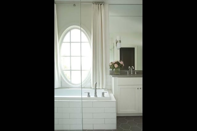 2067 Telfair Cir Unit A & B, Atlanta, GA 30324 - full bath with vanity, a bath, and tile patterned floors