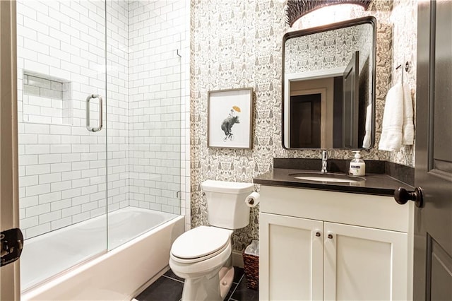 2067 Telfair Cir Unit A & B, Atlanta, GA 30324 - bathroom with vanity, toilet, shower / bath combination with glass door, tile patterned floors, and wallpapered walls