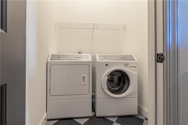 2067 Telfair Cir Unit A & B, Atlanta, GA 30324 - washroom featuring washing machine and clothes dryer, baseboards, and tile patterned floors