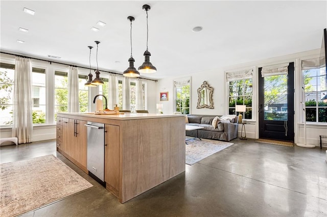 2067 Telfair Cir Unit A & B, Atlanta, GA 30324 - kitchen featuring concrete flooring, a center island with sink, a sink, and stainless steel dishwasher
