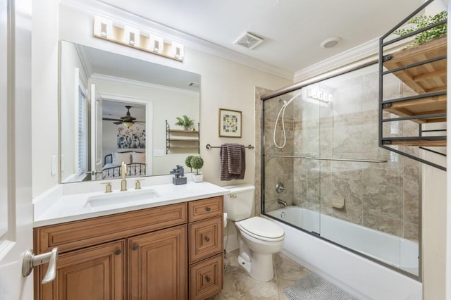 full bathroom featuring enclosed tub / shower combo, vanity, toilet, crown molding, and tile patterned floors