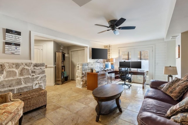 living room with ceiling fan