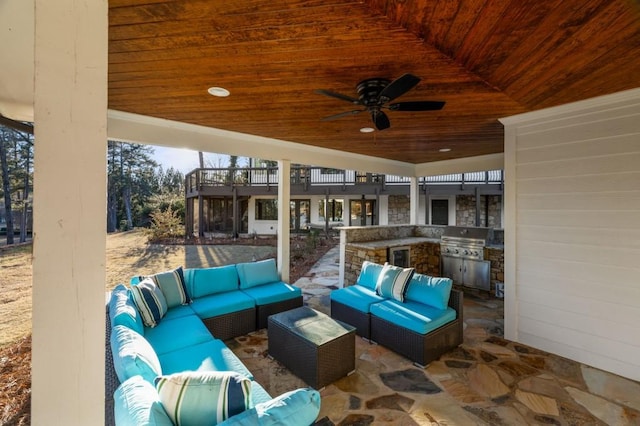 view of patio with area for grilling, an outdoor hangout area, and ceiling fan