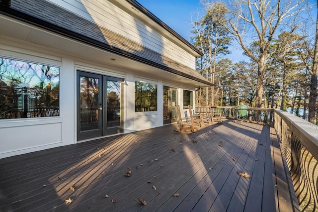 wooden deck featuring french doors