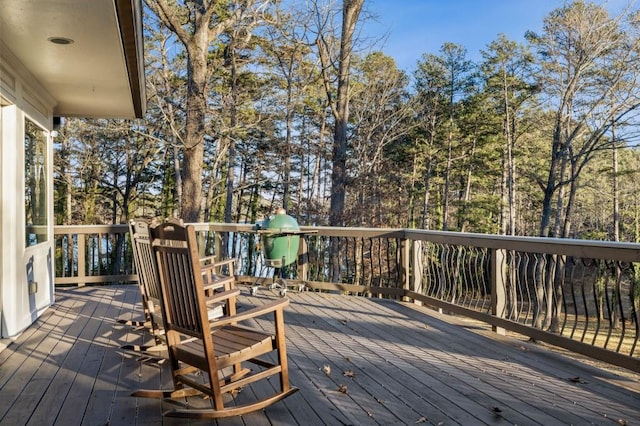 wooden terrace with a playground