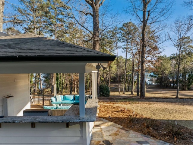 view of patio / terrace with an outdoor living space and a gazebo