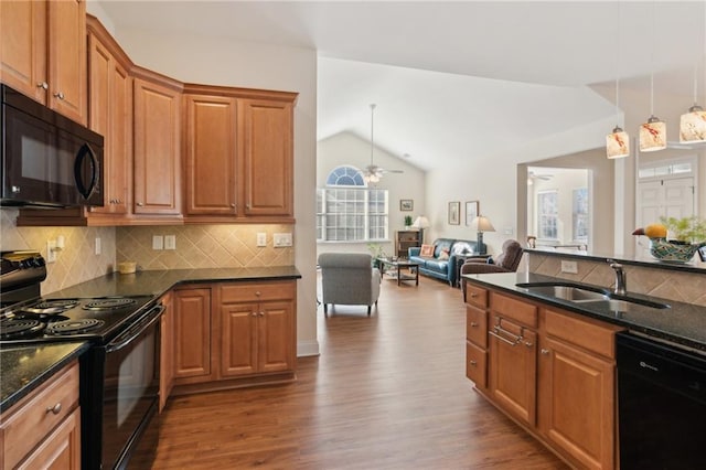 kitchen with ceiling fan, sink, black appliances, and lofted ceiling