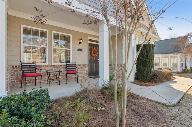 entrance to property with a porch