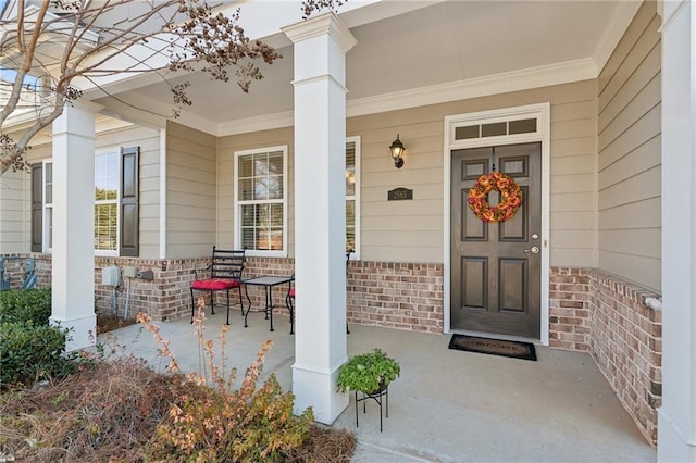 doorway to property with a porch