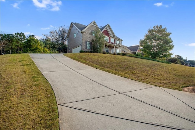 exterior space featuring a garage and a front lawn