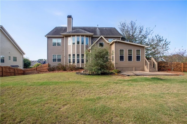 back of property with a patio and a yard