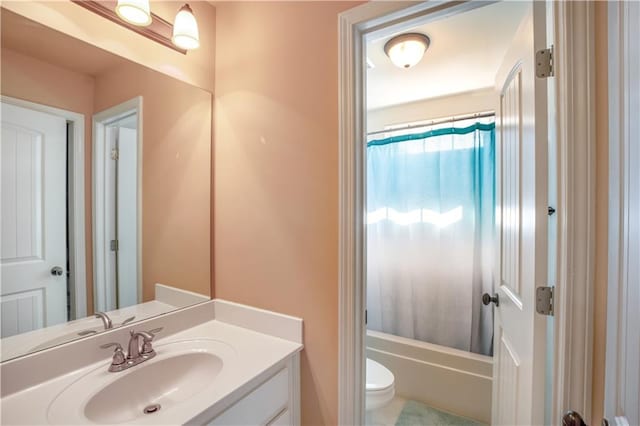 full bathroom with vanity, toilet, and shower / bathtub combination with curtain