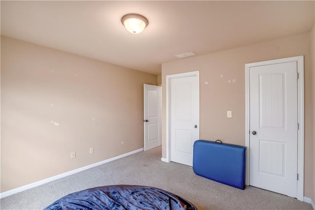 bedroom featuring carpet