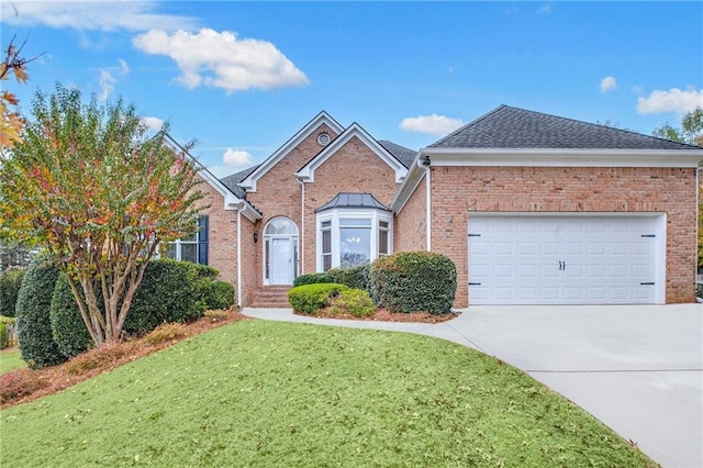 view of front of home featuring a garage, brick siding, concrete driveway, roof with shingles, and a front lawn