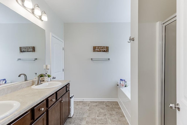 862 Blind Brook Cir, Hoschton, GA 30548 - bathroom featuring double vanity and a bath