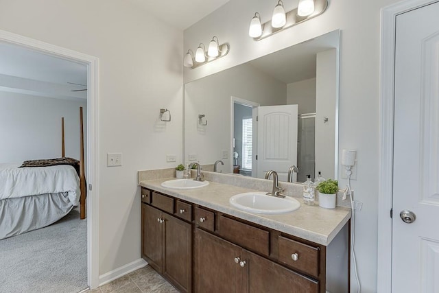 862 Blind Brook Cir, Hoschton, GA 30548 - full bath with ensuite bathroom, double vanity, baseboards, and a shower with door