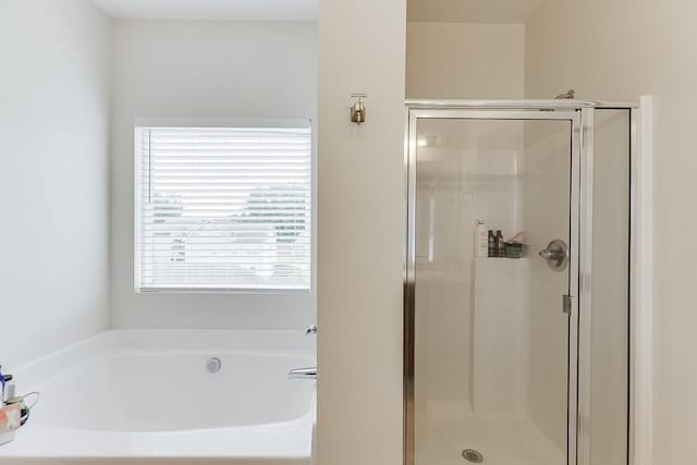 862 Blind Brook Cir, Hoschton, GA 30548 - bathroom featuring a stall shower and a bath