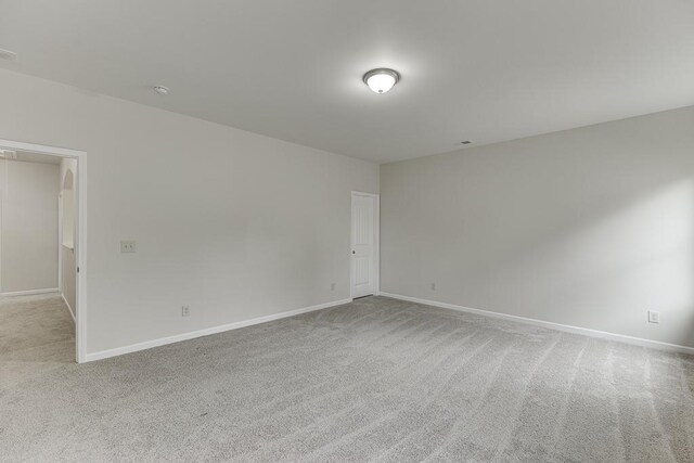 862 Blind Brook Cir, Hoschton, GA 30548 - carpeted empty room featuring baseboards and a smoke detector