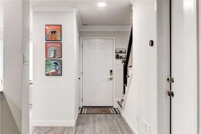 4417 Village Square Ln, Stone Mountain, GA 30083 - corridor featuring light wood-type flooring, stairway, and crown molding