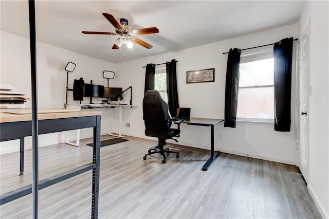 4417 Village Square Ln, Stone Mountain, GA 30083 - office area with wood finished floors, a ceiling fan, and plenty of natural light