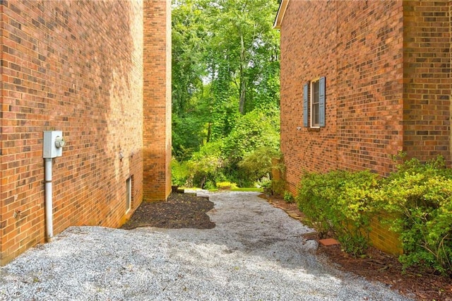 4417 Village Square Ln, Stone Mountain, GA 30083 - view of side of home with brick siding