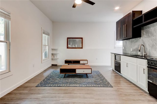 4417 Village Square Ln, Stone Mountain, GA 30083 - living area featuring a ceiling fan, light wood finished floors, and recessed lighting