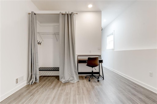 4417 Village Square Ln, Stone Mountain, GA 30083 - bedroom featuring wood finished floors, recessed lighting, and a closet