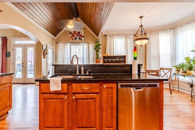 kitchen with french doors, sink, stainless steel dishwasher, vaulted ceiling, and light wood-type flooring