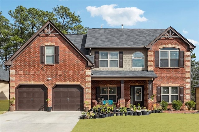 view of front facade featuring a garage and a front lawn