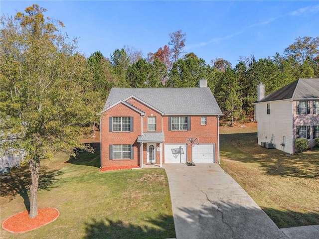 colonial house with a front yard, a garage, and central air condition unit