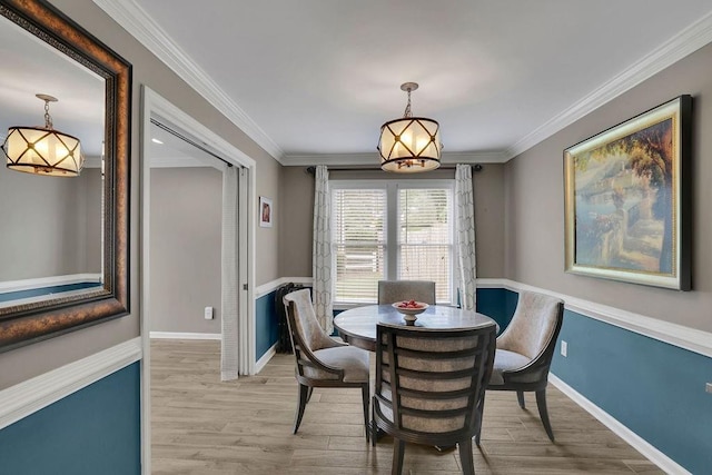 3202 Ivy Station Way, Duluth, GA 30096 - dining room featuring wood finished floors, crown molding, and baseboards