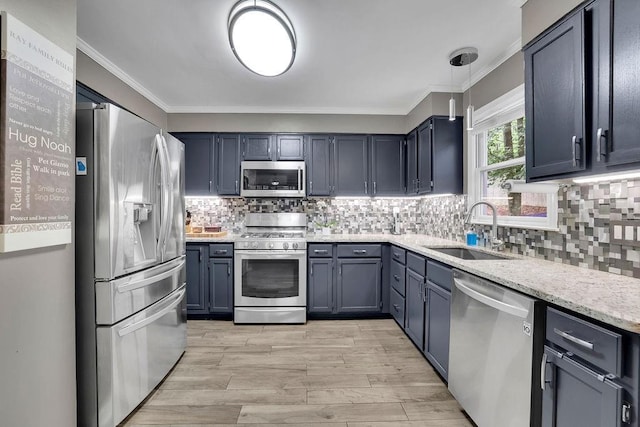 3202 Ivy Station Way, Duluth, GA 30096 - kitchen with stainless steel appliances, a sink, crown molding, decorative backsplash, and light wood-style flooring