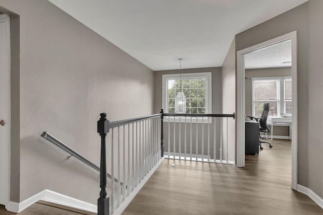 3202 Ivy Station Way, Duluth, GA 30096 - staircase featuring wood finished floors and baseboards