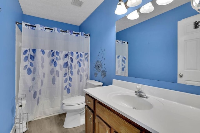 3202 Ivy Station Way, Duluth, GA 30096 - full bath featuring vanity, wood finished floors, toilet, and shower / tub combo with curtain