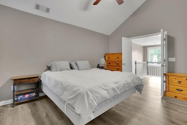 3202 Ivy Station Way, Duluth, GA 30096 - bedroom featuring wood finished floors, high vaulted ceiling, ceiling fan, and baseboards