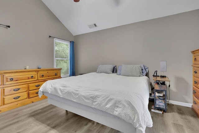 3202 Ivy Station Way, Duluth, GA 30096 - bedroom with light wood finished floors, baseboards, a ceiling fan, and high vaulted ceiling