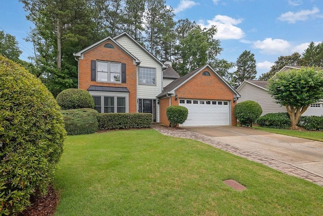 3202 Ivy Station Way, Duluth, GA 30096 - traditional home featuring brick siding, a garage, concrete driveway, and a front yard